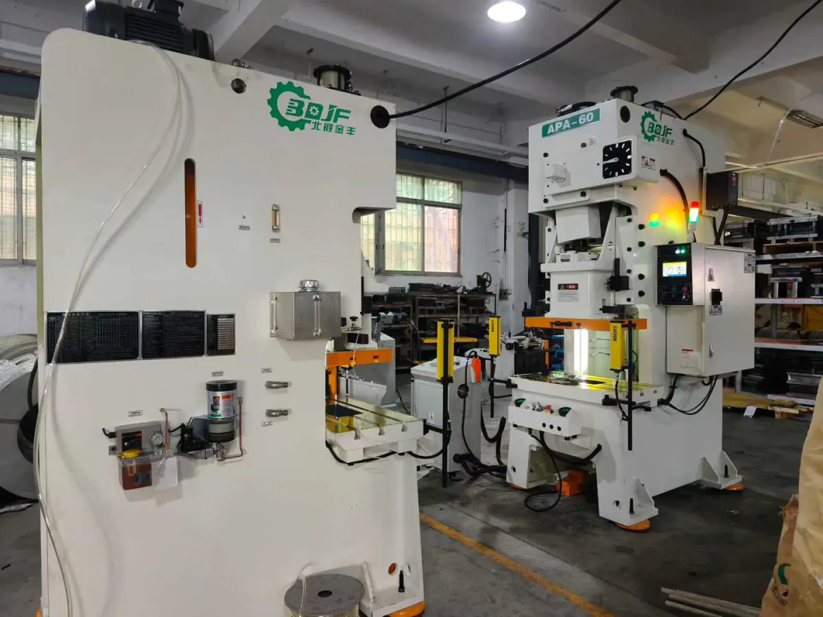 Stamping press in the Varnek busbar machine shop with tooling mounted and guards in place
